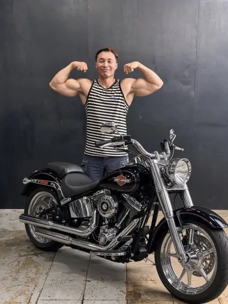 An HB Motors customer with their motorcycle